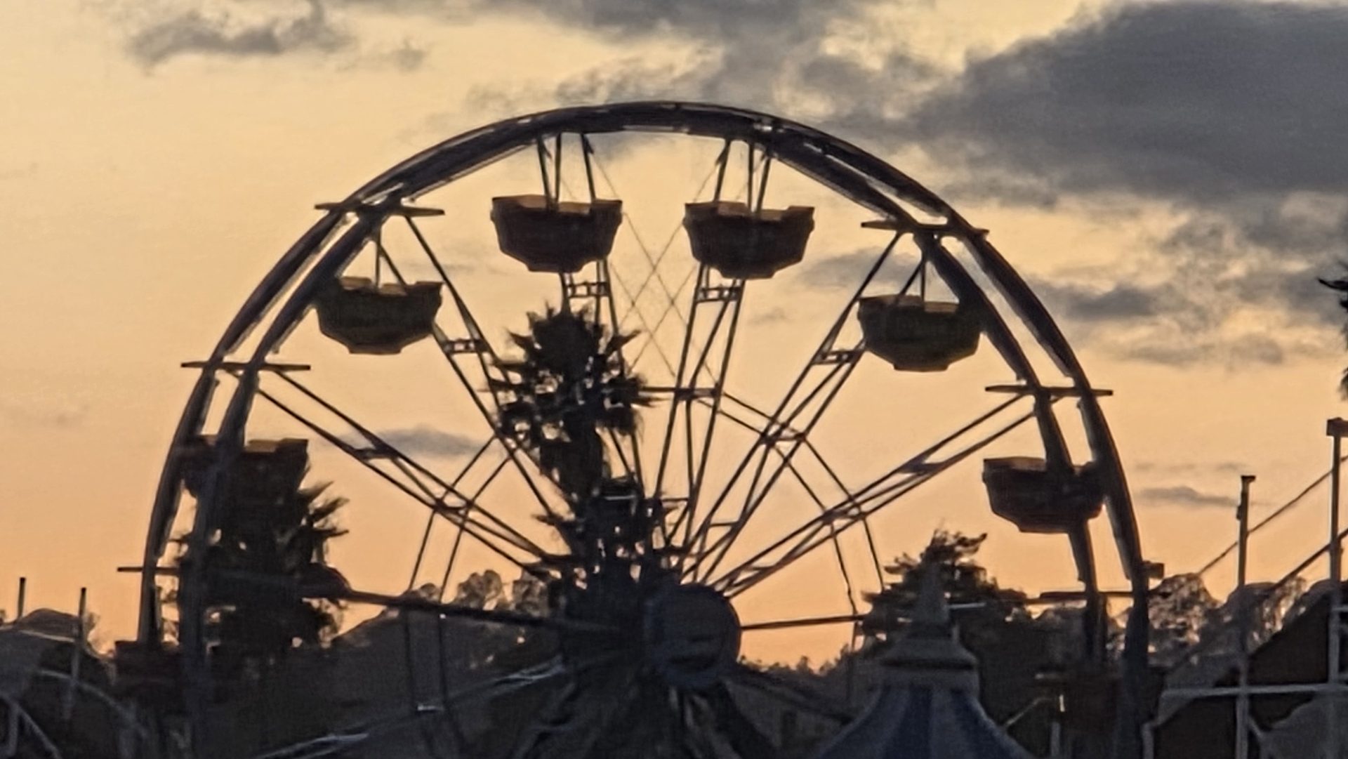 Ferris wheel in silhouette
