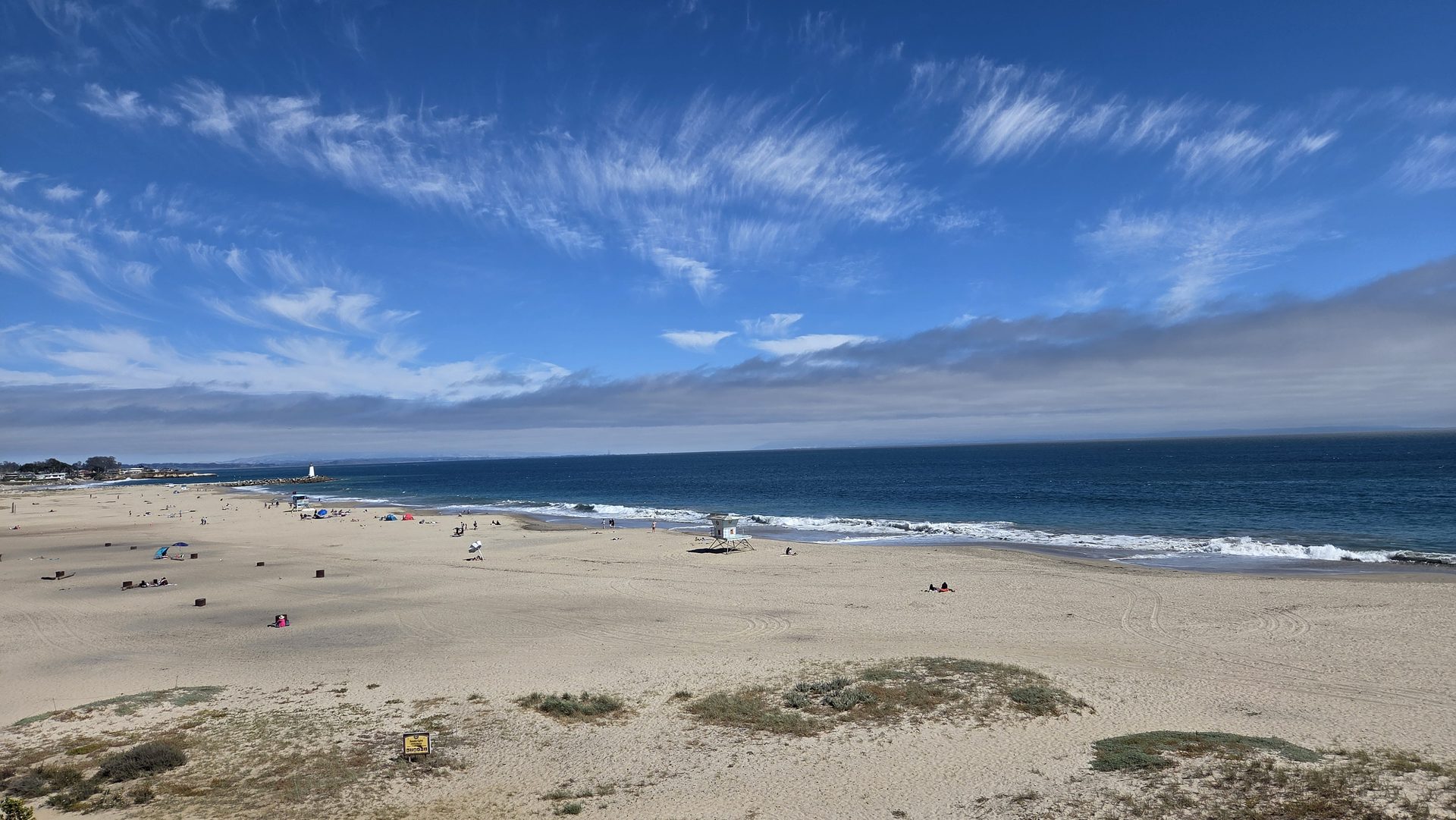 Cirrus over an empty beach