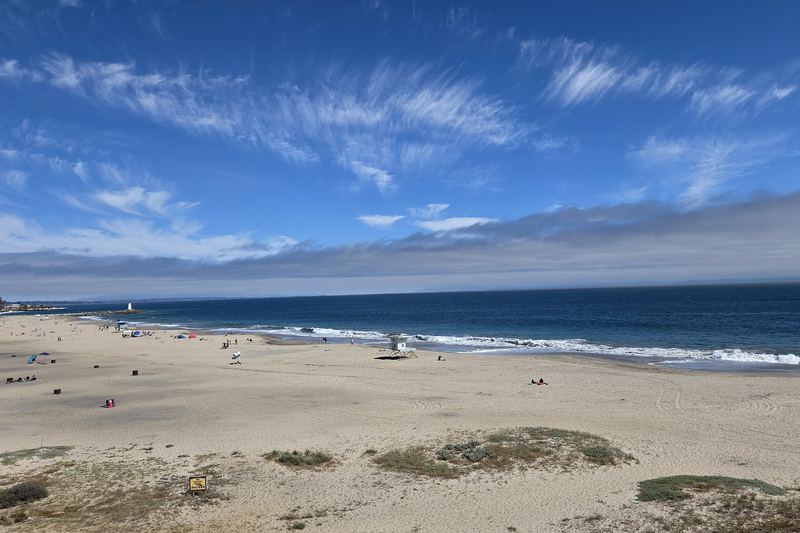 Cirrus over an empty beach