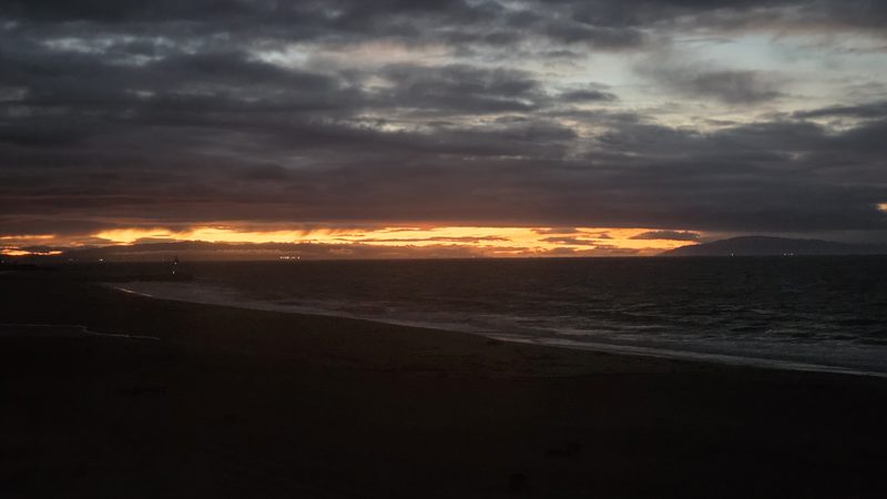 Fire on the horizon at dawn